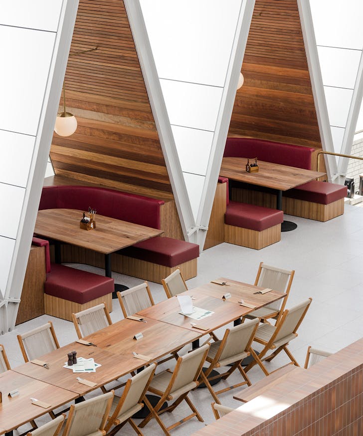 booths underneath a frame style structures