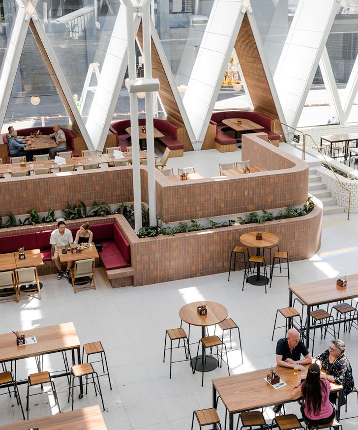 an overhead view of the jubilee hotel's atrium bar area