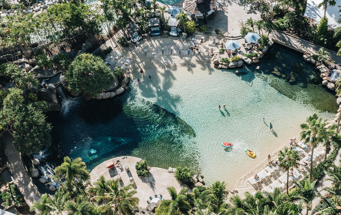 an enormous, lagoon style pool seen from above