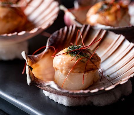 Scallops served on their shell from Kaiza Izakya. 