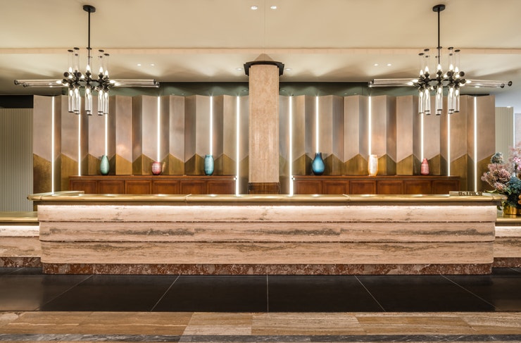 The marble concierge desk at Kimpton Margot Sydney