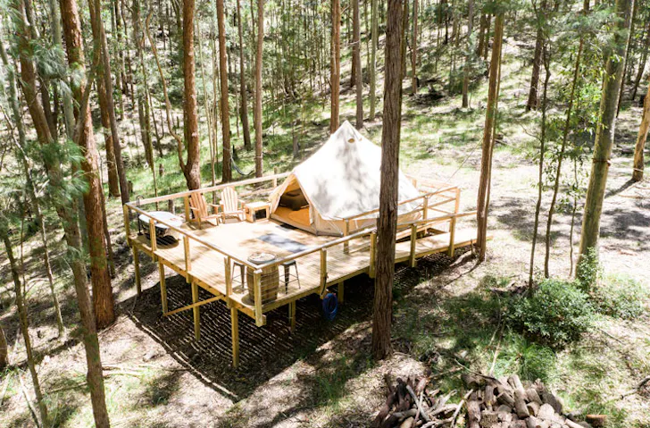 A glamping tent set-up in the bush. 