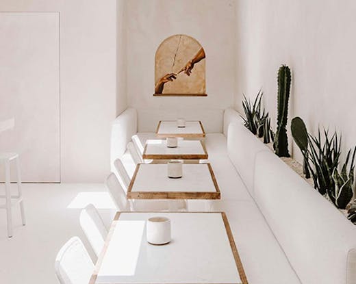 the white interior of a wine bar
