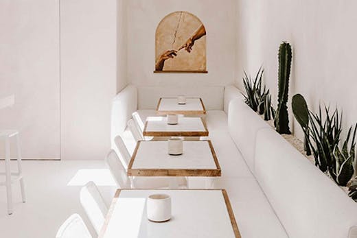 the white interior of a wine bar