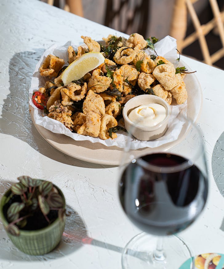 a plate of crispy fried calamari