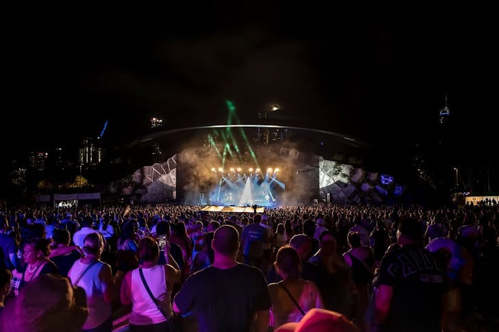 A crowd enjoys L.A.B. playing live at a massive outdoor stage at Darwin Fest.
