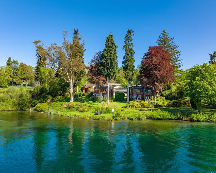 Lakeside cahlets on luscious green grounds.