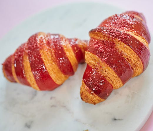 Two raspberry croissants. 