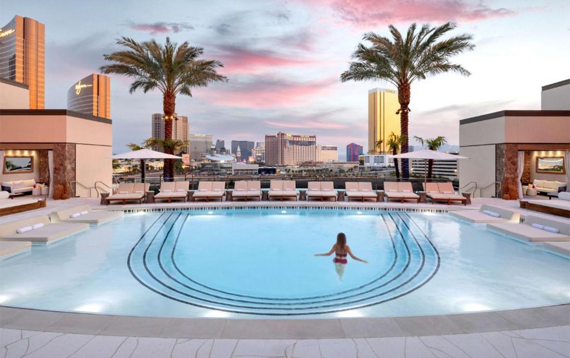 an outdoor pool overlooking las vegas at hotel Crockfords
