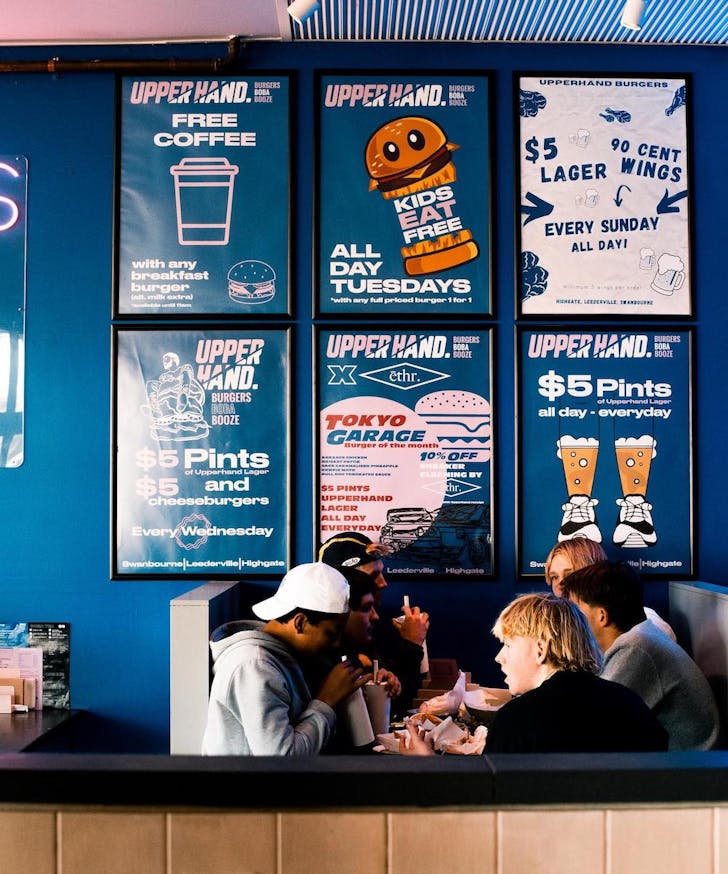 A group of friends enjoying a burger in Leederville