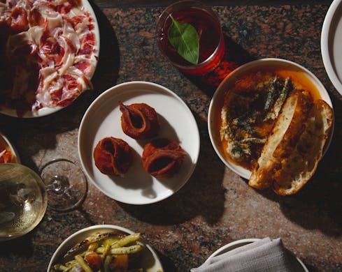 plates of food and drinks at letra house Sydney CBD restaurant bar love tilly group