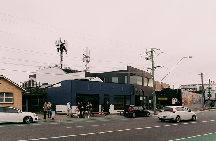 A small one-story building painted completely in a navy blue paint. Levi is serving up one of the best breakfasts in Melbourne
