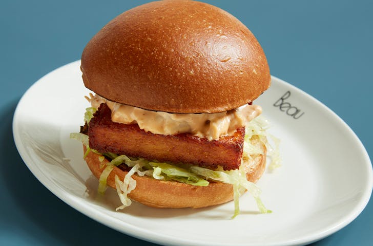 A lobster roll served on a white plate from Beau in Sydney