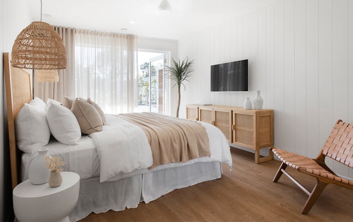 a rattan-decorated motel room