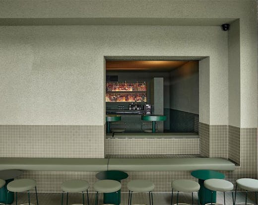 a green tiled bar area at Los in Fortitude Valley 