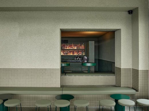 a green tiled bar area at Los in Fortitude Valley 
