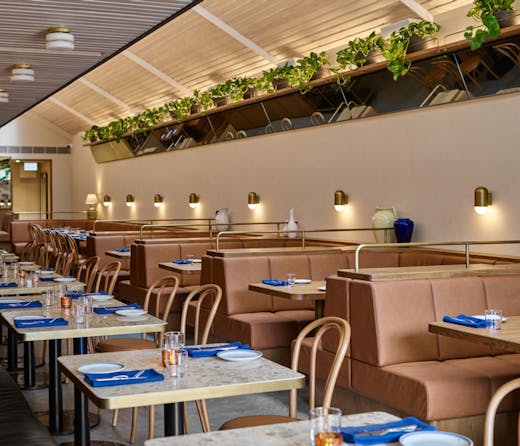 Tables and booths in the dining room at LouLou in Lavender Bay, Sydney. 
