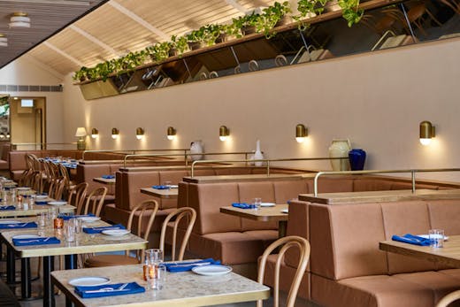 Tables and booths in the dining room at LouLou in Lavender Bay, Sydney.