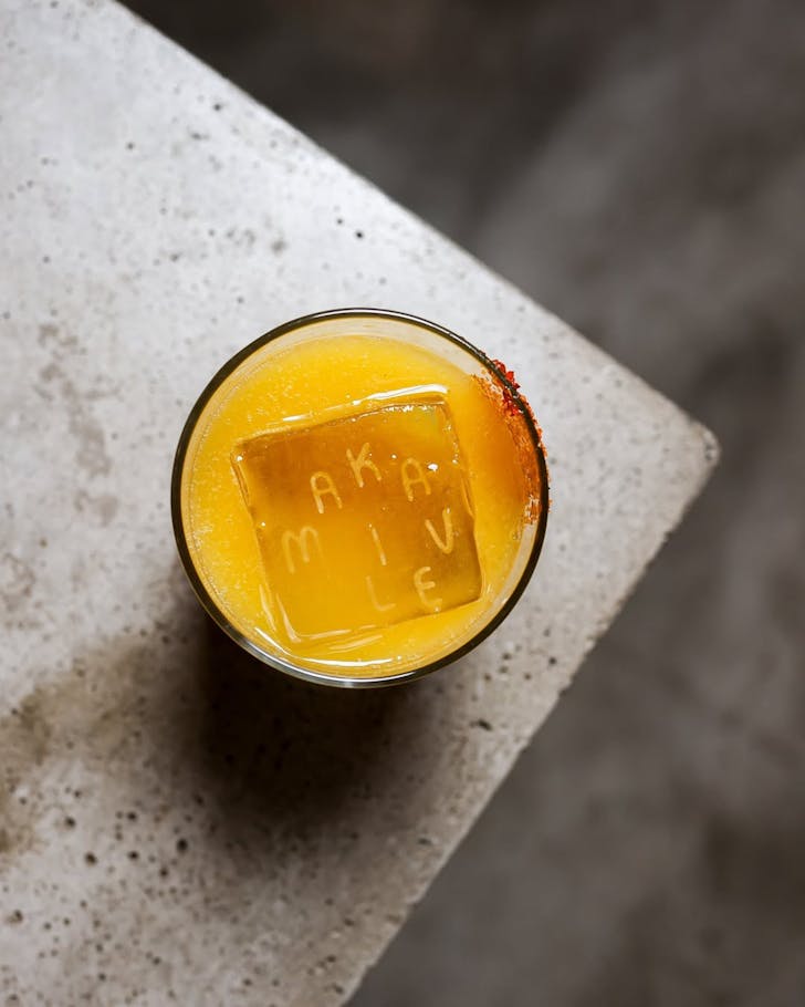 A mango margherita with Makaveli etched into the ice cube