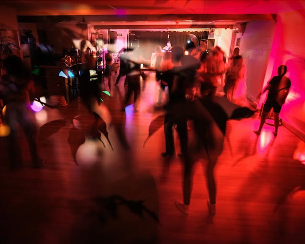 A red-lighted, ephereal Manawa dance night.