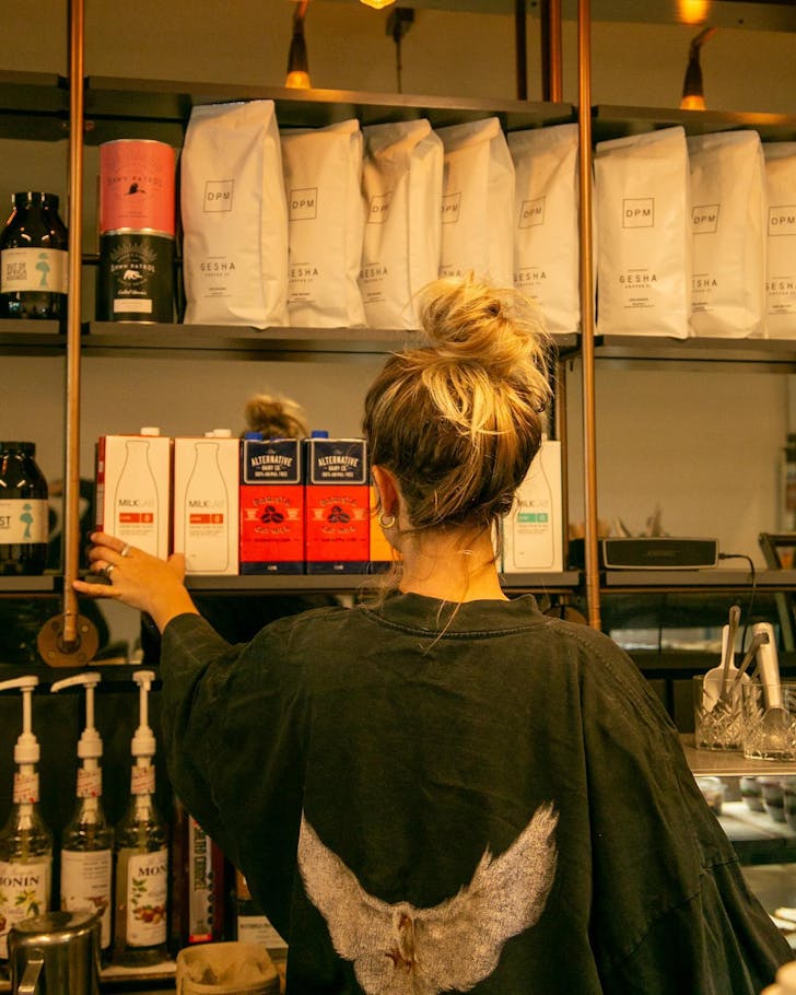 A barista at DPM Cafe in Mandurah