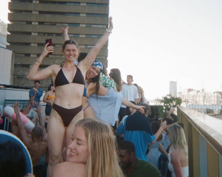 girls pictured next to the pool on a rooftop for maple social club