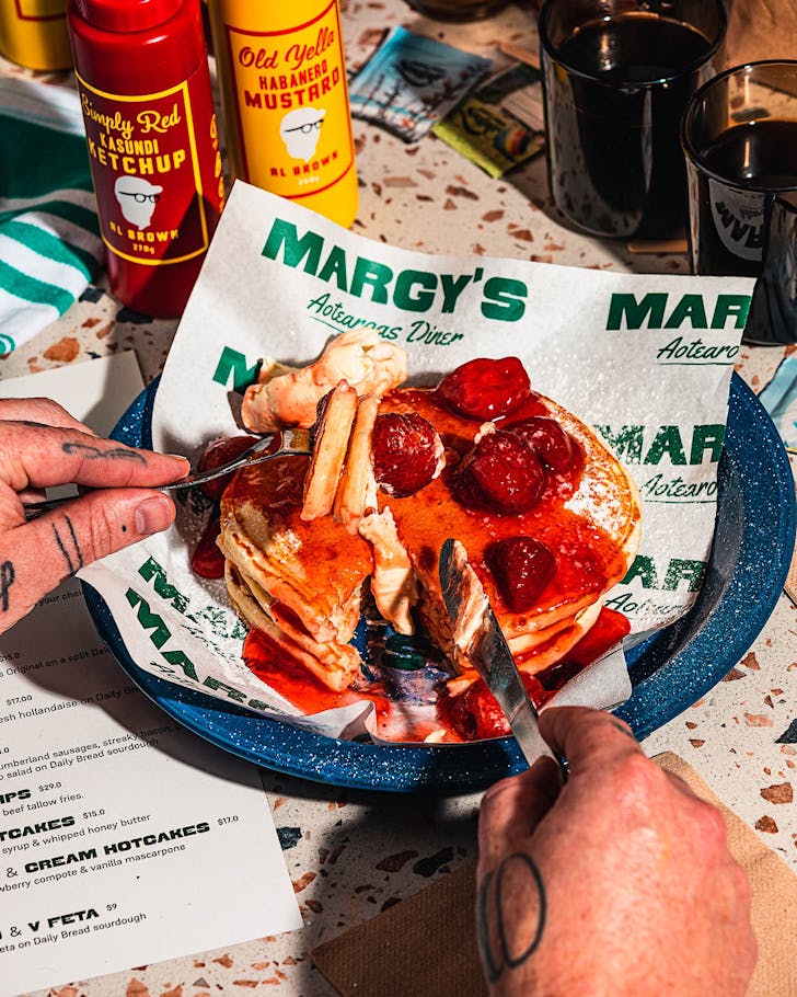 A gorgeous stack of pancakes and strawberries from MARGY'S.
