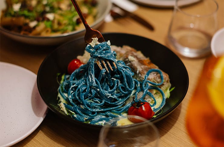 a plate of blue linguine