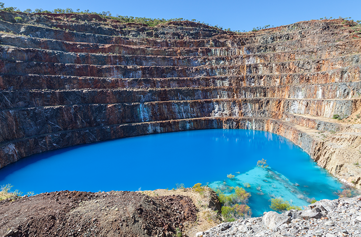 The bright blue dam at the base of Mary Kathleen mine.