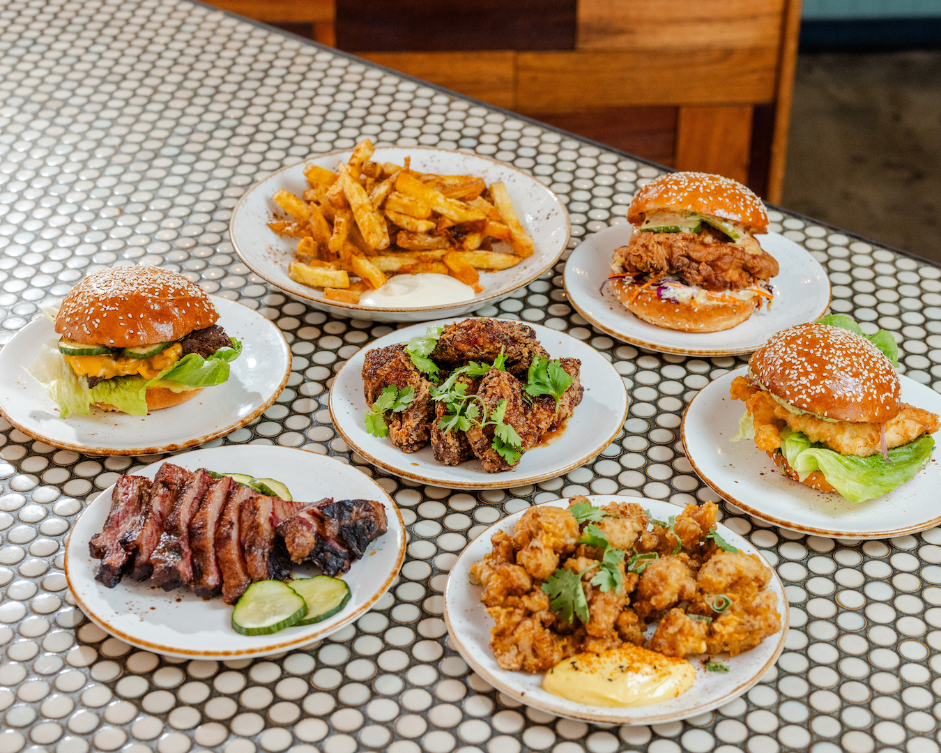 A table full of eats from Mary St Bakery's new burger pop-up