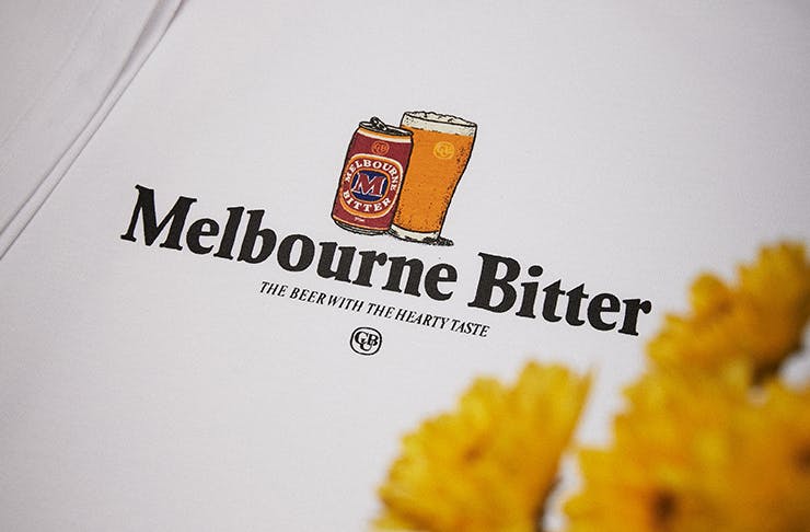 A t-shirt with the Melbourne Bitter logo on the chest.