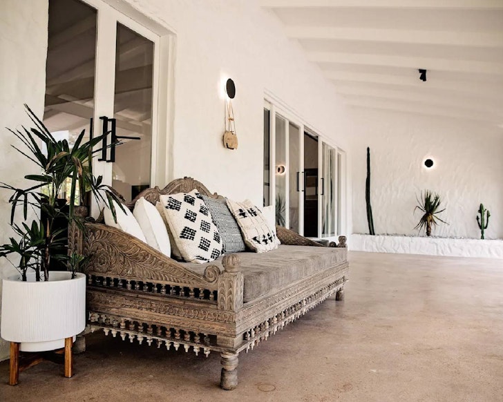 A day bed on the porch at Mediterranean Farmstay one of the best farm stays near Brisbane