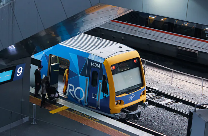 Instant Myki top-ups by a train.