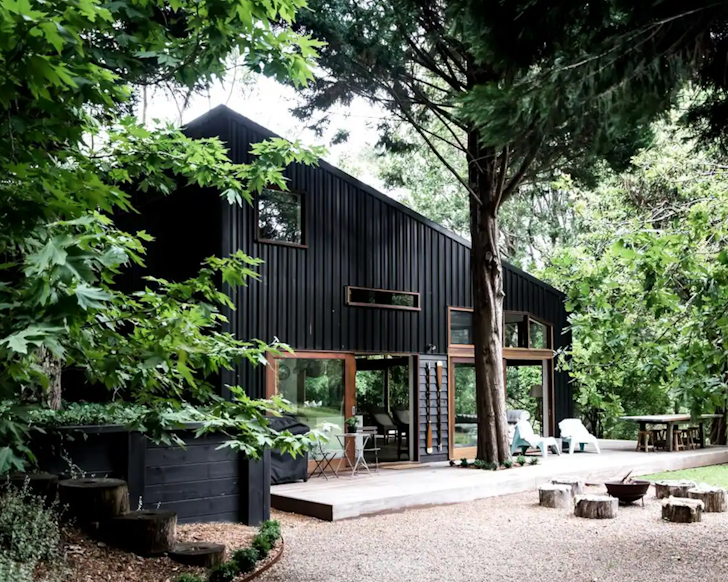 A view of the fire pit in front of Milkwood Barn Airbnb, one of the best pet-friendly stays near Sydney