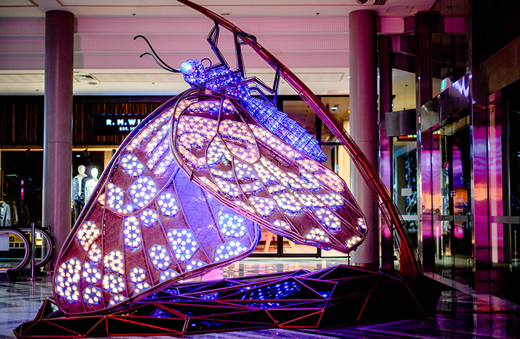 A large purple mechanical butterfly.