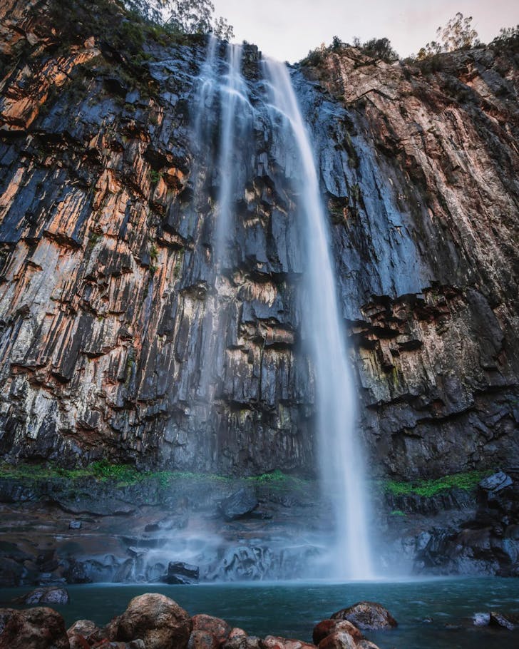 A cascading waterfall at Minyon Falls