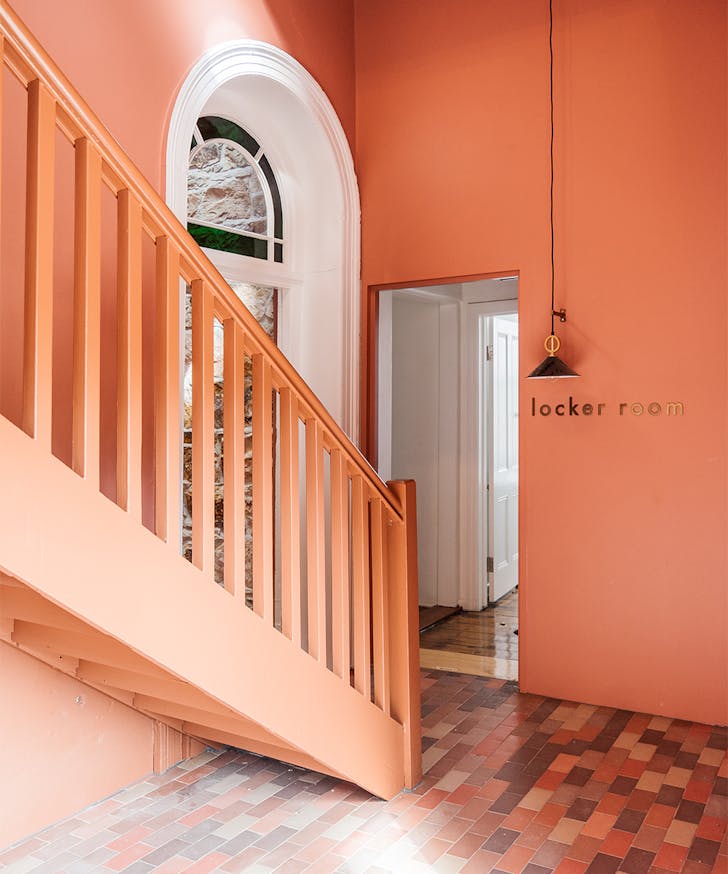 entryway of miss midgleys with pink walls