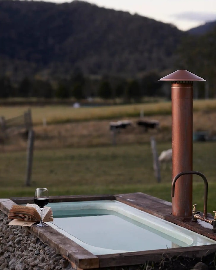 The outdoor bath overlooking fields at Misty Ridge Airbnb bear Brisbane Queensland
