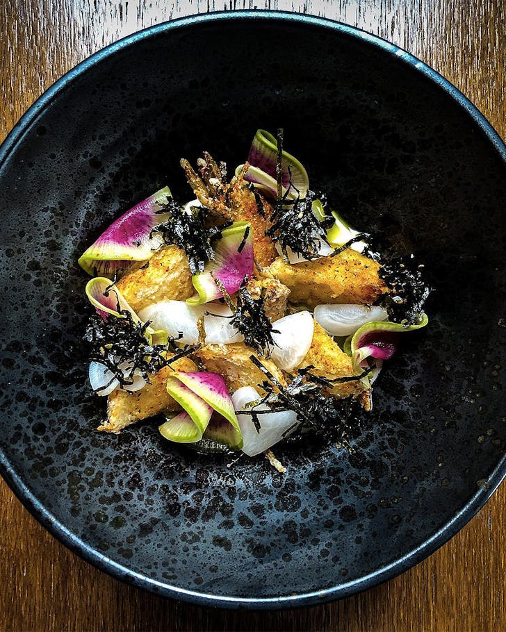 karaage turnip, creme fraiche, sorrel, shichimi, seaweed is served up at Moiety.