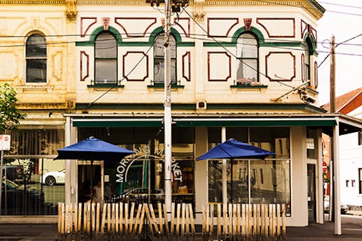 A two storey corner store with