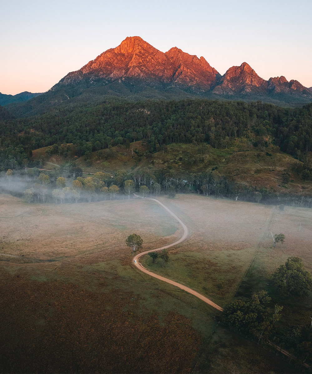 a road leading to mt barney seen from a drone
