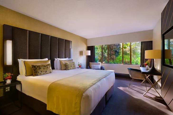 A view of a bedroom at Mövenpick Hotel Wellington one of the best accommodation options