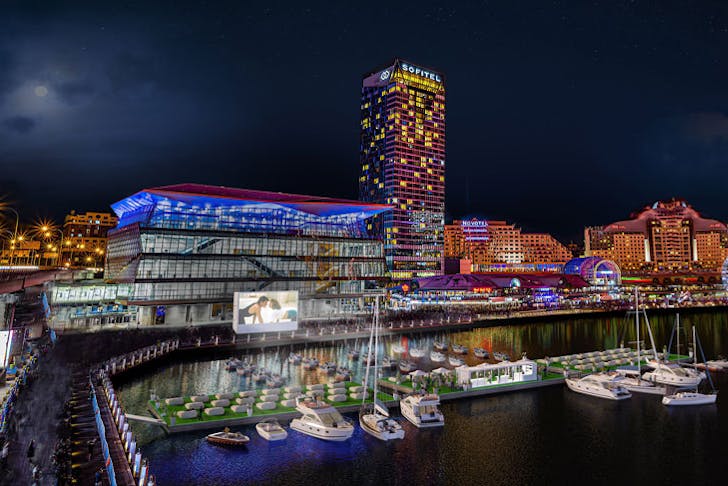 A render image of Darling Harbour in Sydney, complete with a floating cinema. 