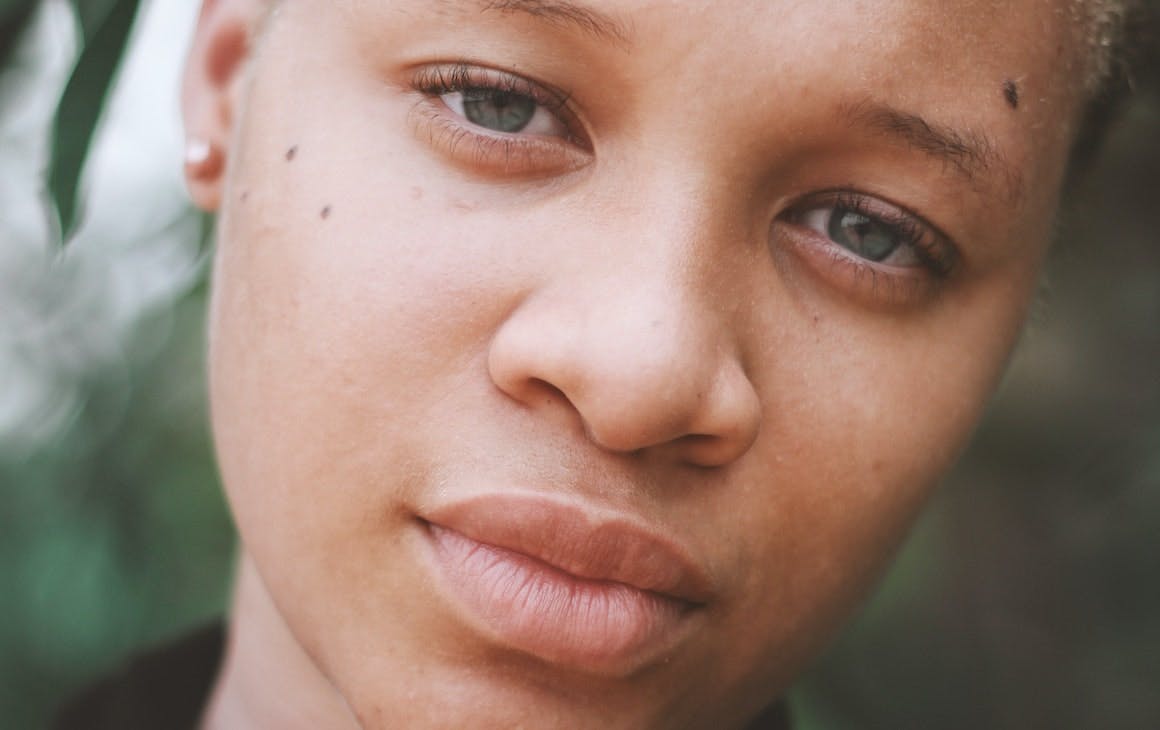 a close up of a woman's face