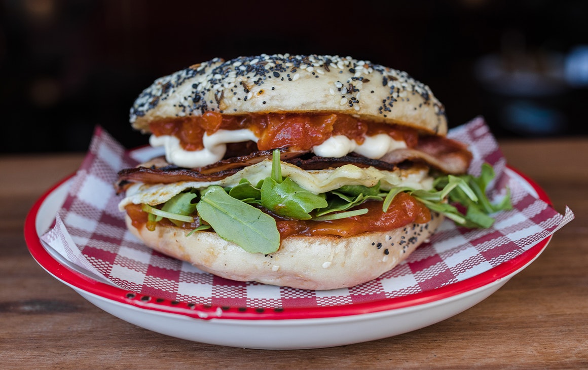 a bagel with bacon and egg 
