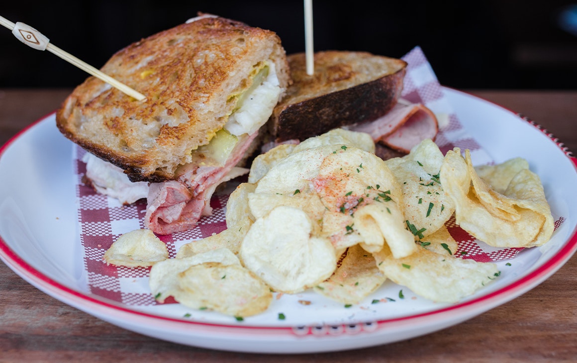 a reuben sandwich with chips