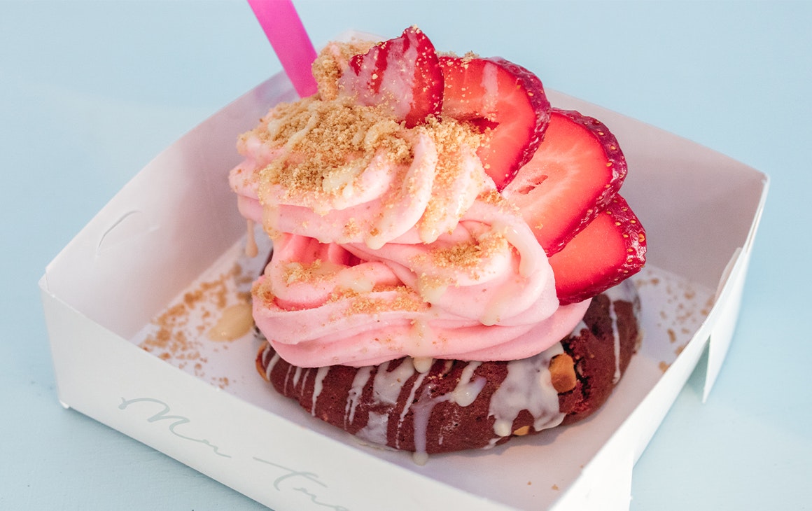 a cookie topped with soft serve