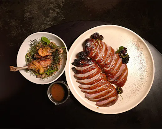 a plate of roast duck