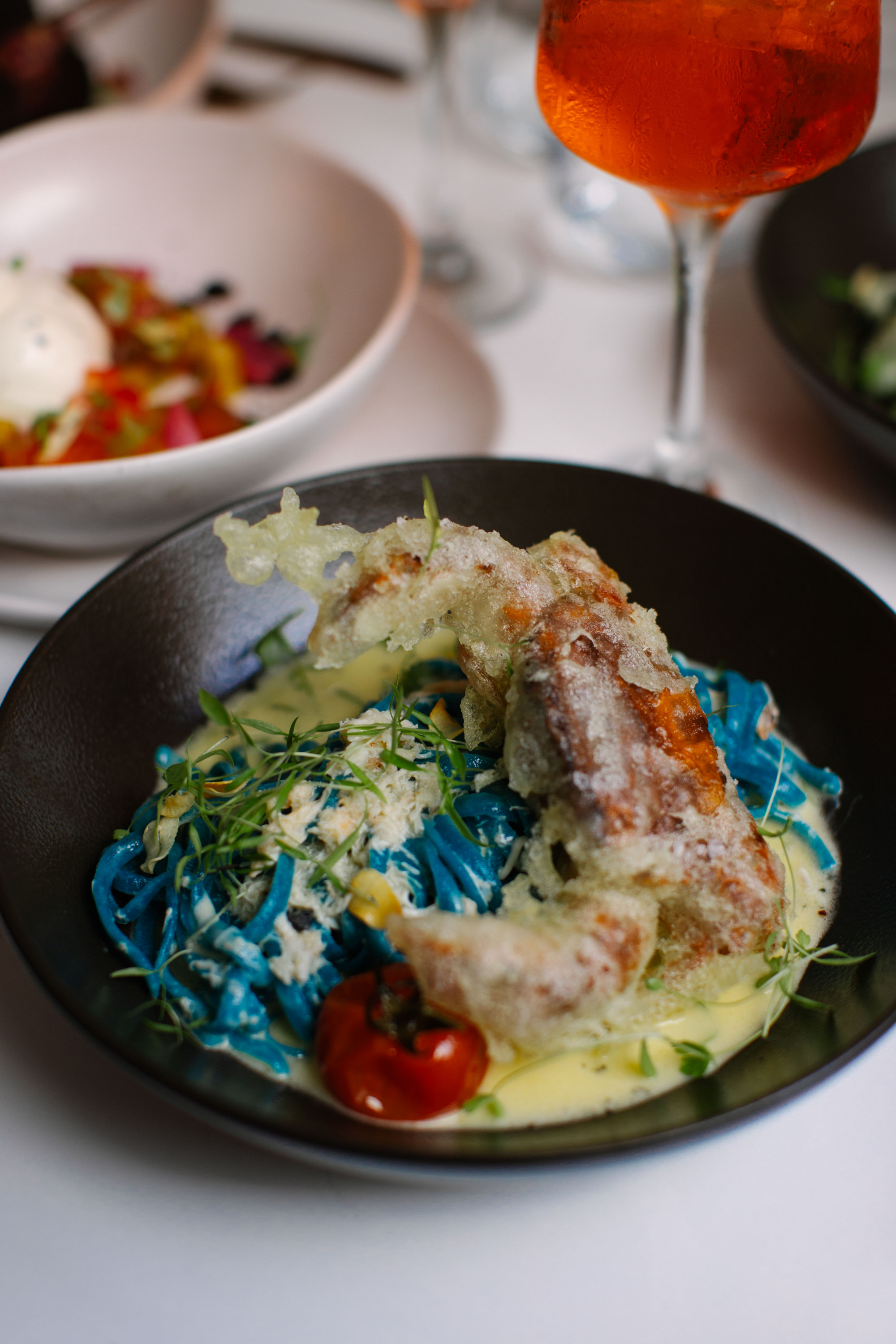 a plate of blue linguine