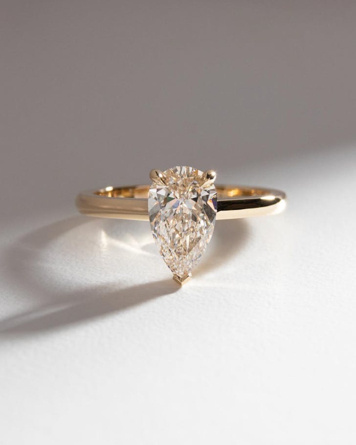 An exquisite pear diamond Naveya and Sloane engagement ring